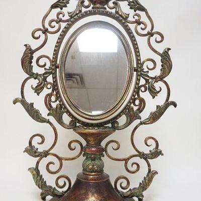 1063	CONTEMPORARY DRESSER MIRROR IN ORNATE LEAF & SCROLL METAL FRAME, APPROXIMATELY 31 IN HIGH
