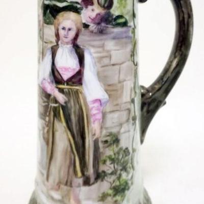 1192	T &V LIMOGES TANKARD PITCHER	T & V LIMOGES HAND PAINTED TANKARD PITCHER, APPROXIMATELY 11 IN HIGH
