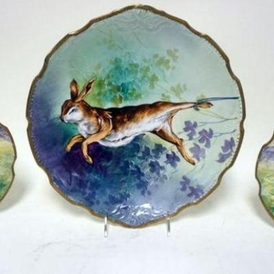 1194	LIMOGES ARTIST IGNED PLATES	LIMOGES HAND PAINTED ARTIST SIGNED PLATES OF RABBITS, LARGEST APPROXIMATELY 12 1/2 IN
