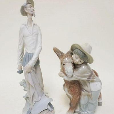 1139	LLADRO LOT OF 2	LLADRO LOT OF 2, MAN STANDING & BOY HUGGING DONKEY, TALLEST IS APPROXIMATELY 12 1/4 IN
