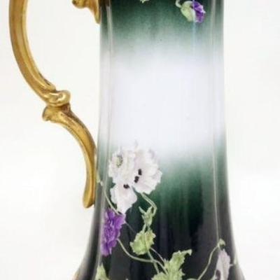 1193	T &V LIMOGES TANKARD PITCHER	T & V LIMOGES HAND PAINTED TANKARD PITCHER, APPROXIMATELY 15 1/2 IN HIGH
