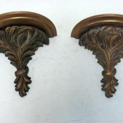 1215	4 SYROCO WOOD GILT FINISHED WALL SHELVES	LOT OF 4 SYROCO WOOD GILT FINISHED WALL SHELVES, APPROXIMATELY 10 IN HIGH
