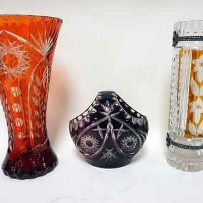 1216	3 CUT TO CLEAR GLASS VASE & BASKET	LOT OF 3 CUT TO CLEAR GLASS VASES AND BASKET, TALLEST APPROXIMATELY 13 IN HIGH
