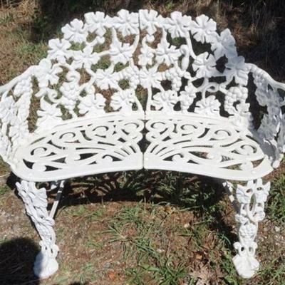 1276	CAST METAL GARDEN BENCH	CAST METAL GARDEN BENCH, APPROXIMATELY 34 IN X 19 IN X 27 IN HIGH
