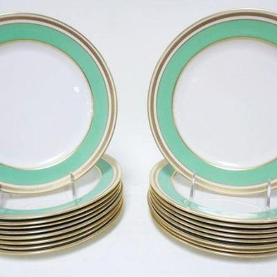 1184	18 LENOX CHINA PLATES	LOT OF 18 LENOX 9 IN PLATES WITH GREEN BORDERS AND GILT TRIM. MADE FOR LORING ANDREWS COMPANY
