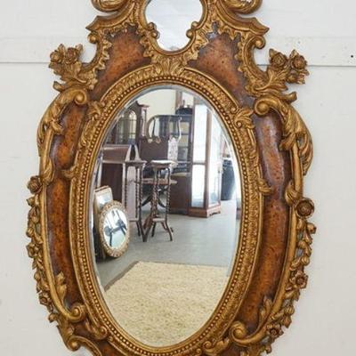1016	LARGE ORNATE BEVEL EDGED MIRROR IN ORNATE GILT & BIRDSEYE FINISHED FRAME, APPROXIMATELY 14 IN X 73 IN HIGH

