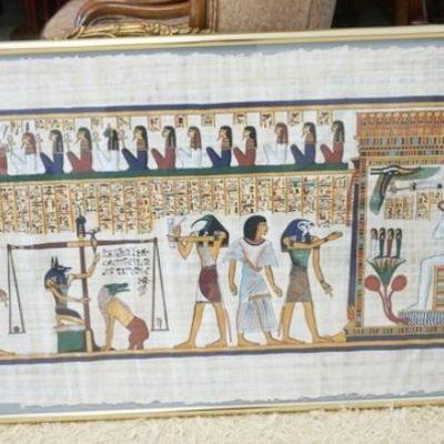 1103	EGYPTIAN PAPYRUS LARGE ARTWORK	EGYPTIAN PAPYRUS LARGE ARTWORK FRAMED UNDER GLASS, SIGNED LOWER LEFT, 61 IN X 30 IN

