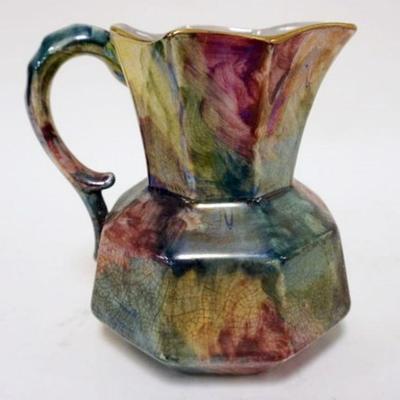1174	STOKE ON TRENT SHANCOCK AND SONS PITCHER	STOKE ON TRENT SHANCOCK AND SONS MULTI COLORED GLAZED PITCHER, APPROXIMATELY 6 IN HIGH
