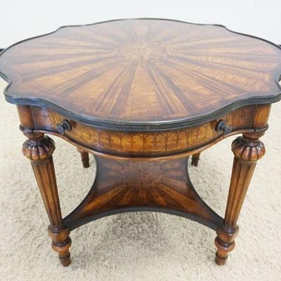 1013	THEODORE ALEXANDER INLAID OCCASIONAL TABLE HAVING 2 SUNBURST VENEER PATTERN ON TOP W/2 DRAWERS, APPROXIMATELY 39 IN X 31 IN HIGH
