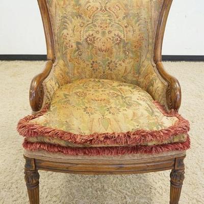 1026	ORNATE UPHOLSTERED ARMCHAIR W/FLUTED LEGS & SPIRAL CURLED ARM ENDS
