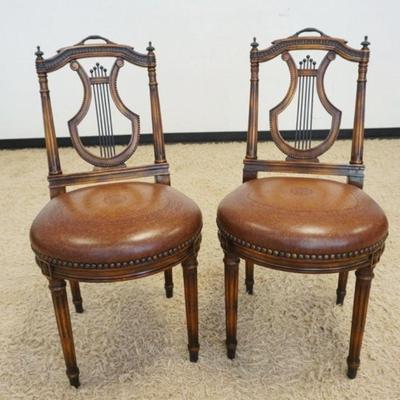 1032	PAIR OF LYRE BACK LEATHER SEAT SIDE CHAIRS W/METAL FINIALS
