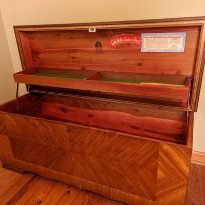 This is a Lane waterfall cedar chest (Style No 2520) made in 1950! It still has the original tags affixed to the lid!