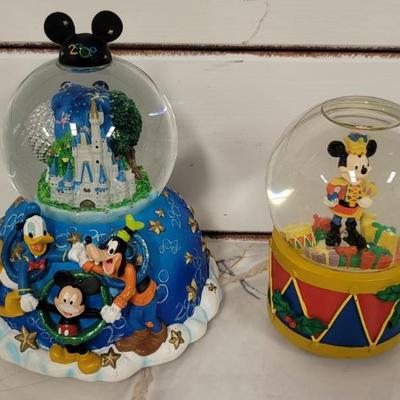 (2) Disney Musical Snow Globes Include:
Mickey, Donald, & Goofy 2000 - Disney Celebrate the Future
