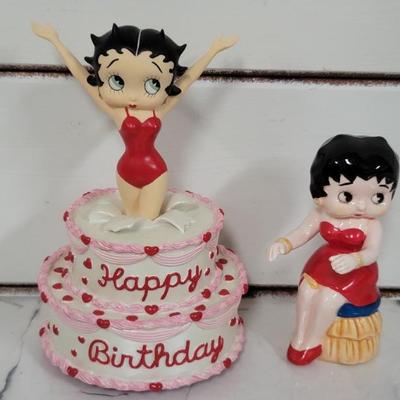 (2) Betty Boop: 1- Musical Popping Out of Cake 
1- Ceramic Seated Figurine