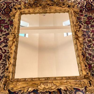 Great heavily decorated mirrored frame 