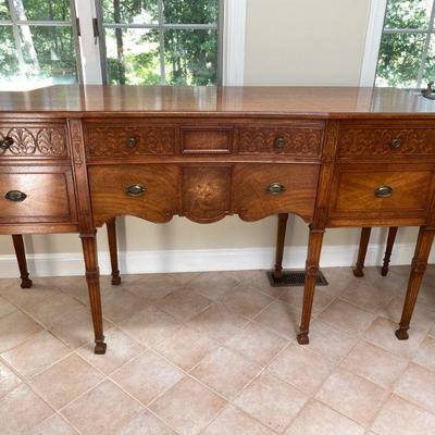 French style continues with this unique skirted buffet  