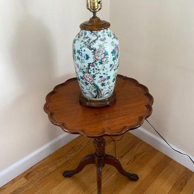 Tilt top pie crust table and a beautifully converted vase  