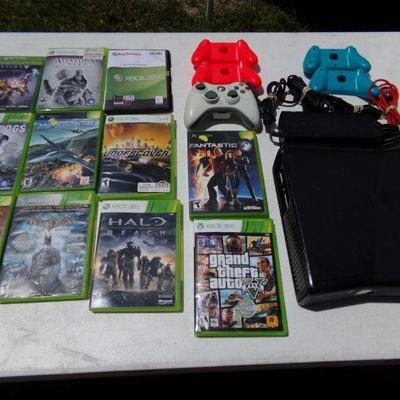 Xbox 360 Game and Controllers and 11 games.