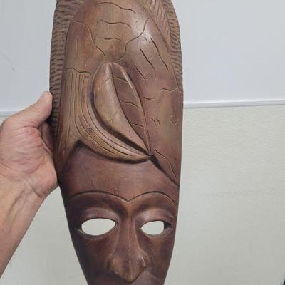 This is the matching mask in the previous lot, Hand carved, very good condition, measures approximately 18