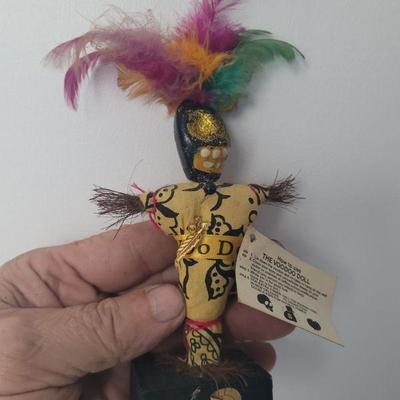 African Voodoo Doll with instructions on how to use it, this is strictly for entertainment purposes only. Stands approximately 6