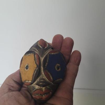 Very small, hand carved African mask, hand painted, very good condition, approximately 3