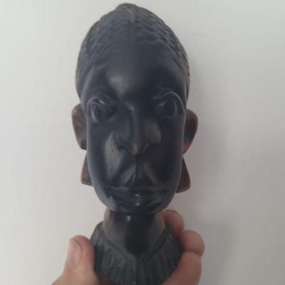One of a pair of hand carved male head bust figurine, very good condition, measures approximately 7