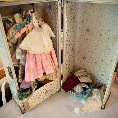 Vintage doll clothes in trunk