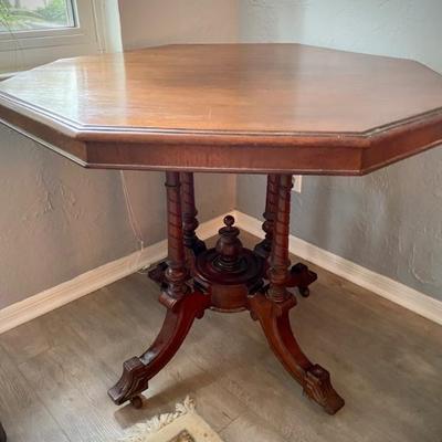 Antique octagon table with casters