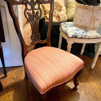 Antique child's chair with caster