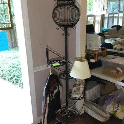 The bird cage/plant stand has been sold.  So has the Harley leather jacket.