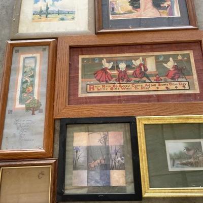 Lots of pictures and picture frames 