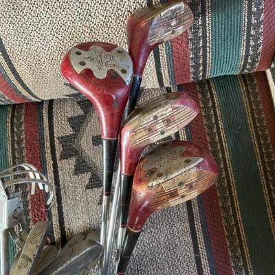 Full set of persimmon gulf clubs and caring bag