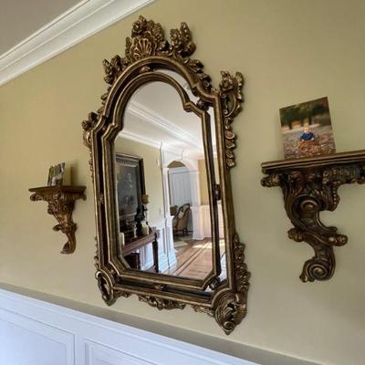 sconces on each side and mirror