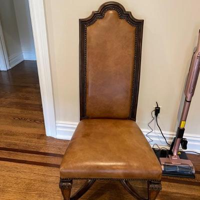 three leather chairs