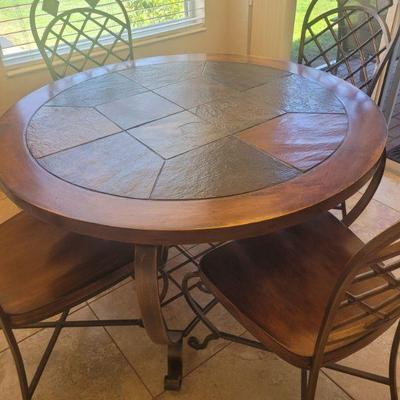 nearly new, very nice dinette table and four chairs