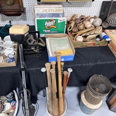 Baseball Bats, Baseball Gloves and Balls, Minnow Buckets, Beatles Records, Boat Motor