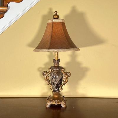 MARBLE TABLE LAMP | Black marble with gilt composition scrolled sides; h. 23-1/2 x dia. 12 in. [appearing in overall good condition]