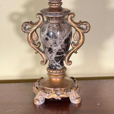 MARBLE TABLE LAMP | Black marble with gilt composition scrolled sides; h. 23-1/2 x dia. 12 in. [appearing in overall good condition]