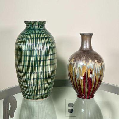 (2pc) POTTERY VASES | Two decorative pottery vases, including a green and brown ribbed vase (h. 12-1/2 in.) and a flambÃ© style vase with...