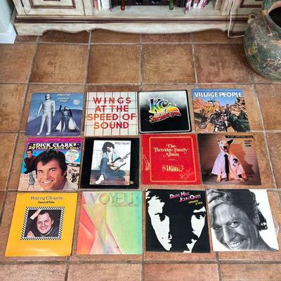 (12pc) MISC VINYL RECORDS | Including wings at the speed of sound, good night Vienna by Ringo Starr, Dick Clark, Hall and Oates, and others