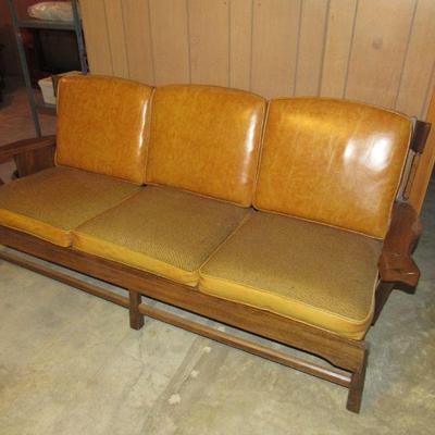 Howard furniture couch, chair with ottoman and chair