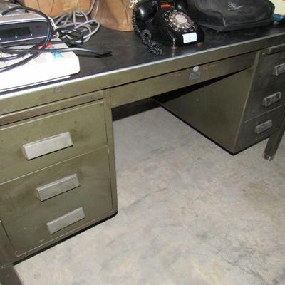 Large desk that you can actually sit at on both sides- very unique