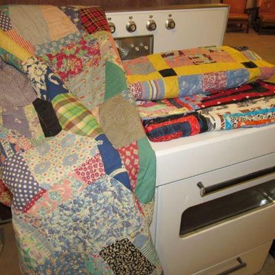 Old quilt and quilt tops