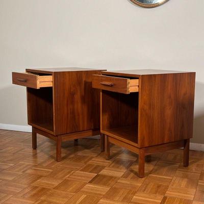 PAIR MID-CENTURY END TABLES | Mid-century modern bedside tables or night stands, each having a single drawer over an open shelf - h....
