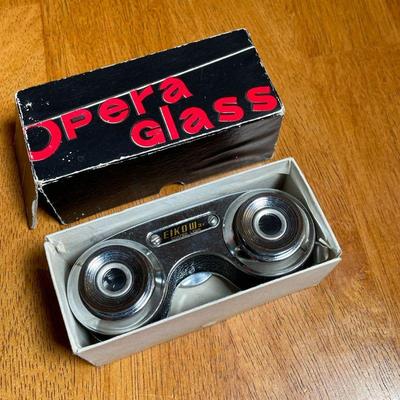 PAIR NIKON & OPERA GLASS BINOCULARS | Nikon 8 x 24 binoculars with travel bag and lens cloth, and Opera Glass Eikow 3x binoculars, both...