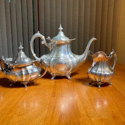 (3pc) REED & BARTON STERLING SILVER | Hampton Court, Shields by Reed and Barton, including a teapot, covered sugar, and an open creamer;...