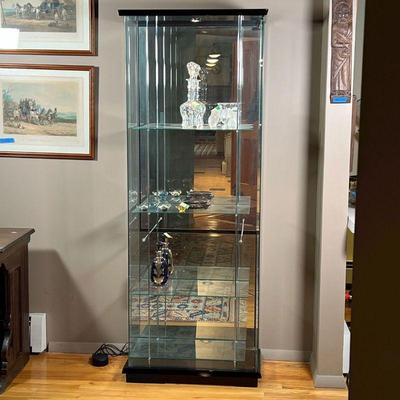 CONTEMPORARY DISPLAY CABINET | With mirrored back and glass side and front panel, with glass door opening on the right side,...