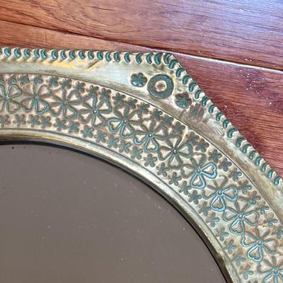 OCTAGONAL BRASS MIRROR | Round mirror within in an octagonal brass frame with patina - dia. 12-1/8 in.