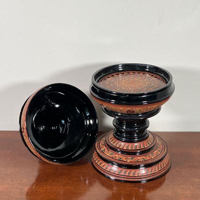 LACQUERED JAR | Black and rust lacquered jar with two interior compartments, with spindle finial - h. 18-1/2 x 7-1/2 in.