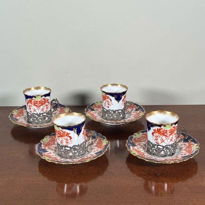 (8pc) AYNSLEY DEMITASSE CUPS & SAUCERS | A set of four Aynsley England silver demitasse cups with sterling silver liners (h. 2-1/2 in.)...